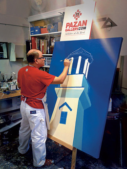 Pazan in his studio painting